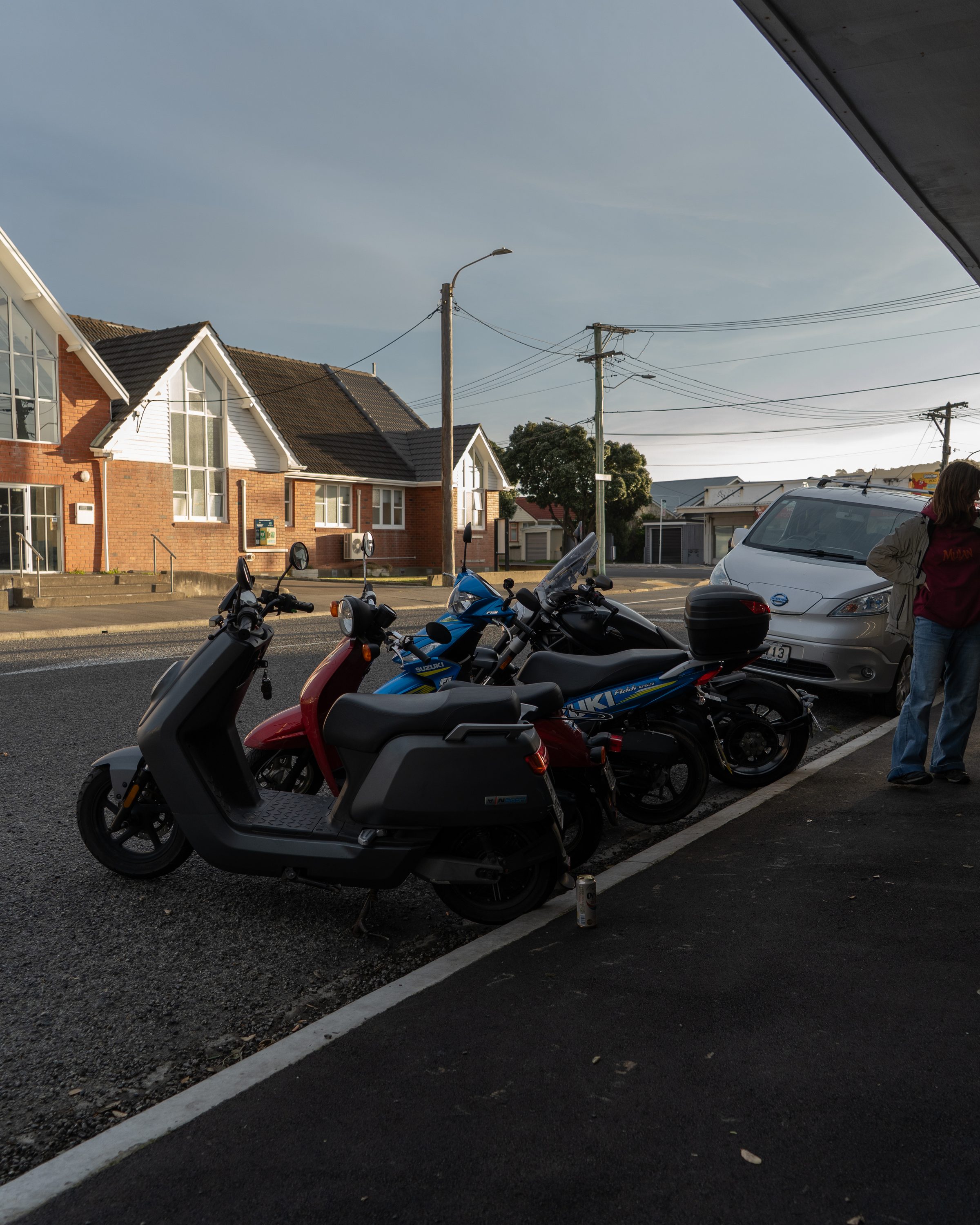 Sportbike detail shot lit by golden hour light on location.